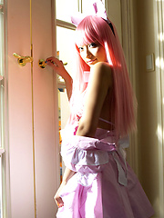 Sexy gravure idol babe naked in a cute pink wig and maid costume