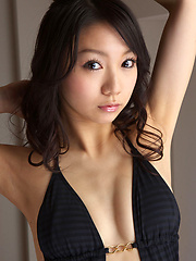 Alluring asian angel looks incredible in her fish net stockings