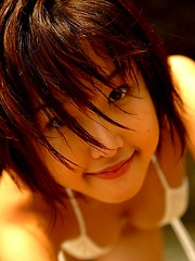 Sexy Japanese teen enjoys modeling in tight shorts