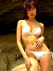 Sexy Japanese teen enjoys modeling in tight shorts