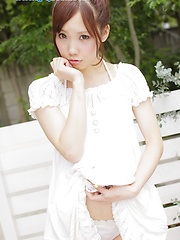 Very hot asian schoolgirl Asuka Yonezawa moves apart her sexy legs