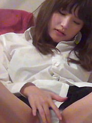 Japanese teen plays with her pussy