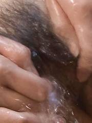 Mai Hanano Asian sucks balls and rubs penis between big knockers