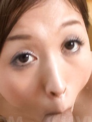 Mai Hanano Asian sucks balls and rubs penis between big knockers