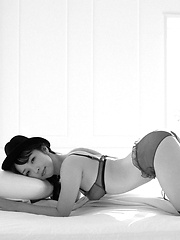 Neo Asian babe shows fine ass in lace panty and hides nude boobs