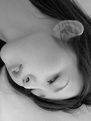 Neo Asian babe shows fine ass in lace panty and hides nude boobs