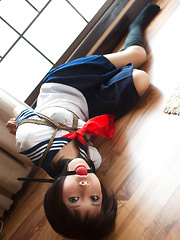 Dimdim Asian in school uniform is tied in ropes and canÂ´t scream