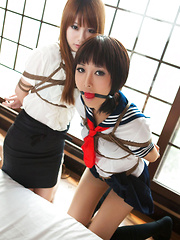 Dimdim Asian in school uniform is tied in ropes and canÂ´t scream