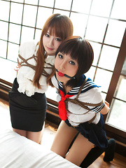 Dimdim Asian in school uniform is tied in ropes and canÂ´t scream