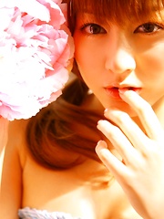 Yumi Sugimoto Asian is sexy baby surrounded by colorful flowers