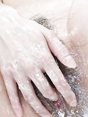 Sara Seori Asian pours cream all over hot body and rubs her twat