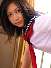 Kaori Ishii Asian is naughty and shows legs under uniform skirt