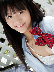 Miho Morita Asian takes school uniform off and shows body outdoor