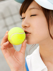 Kana Yuuki Asian shows flexibility while playing with tennis ball