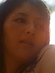 Neo Asian babe with hot curves comes from water like a goddess