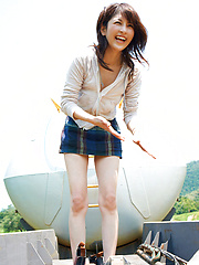 Neo Asian babe in short skirt loves playing in dangerous places