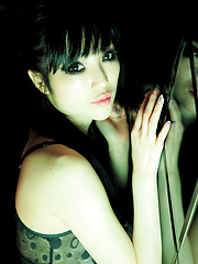 Neo Asian babe with firm big boobs in kinky bra is club dancer