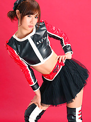 Ai Kumano Asian is leering chick in long boots and short skirt