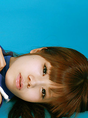 Asuka Nakano Asian with nasty smile poses in very short skirt