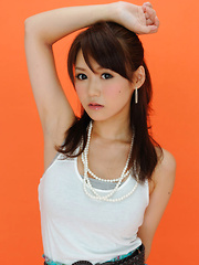 Yumi Asian is such cute and playful honey in white top and skirt