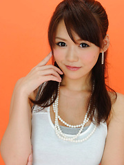 Yumi Asian is such cute and playful honey in white top and skirt