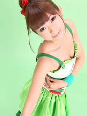 Zuo Qi Asian doll in cute outfit smiles like a true princess