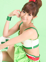 Zuo Qi Asian doll in cute outfit smiles like a true princess