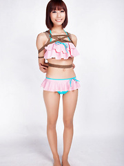 Ayaka Asian babe in tiny lingerie smiles while is tied in ropes