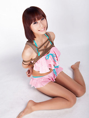 Ayaka Asian babe in tiny lingerie smiles while is tied in ropes