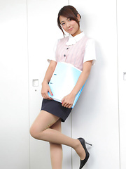 Naoho Ichihashi Asian in tight skirt is a very attractive doll