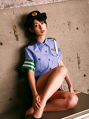 Rina Akiyama Asian in police woman uniform exposes sexy legs