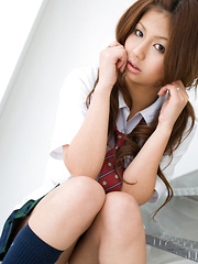 Sasha Asian chick shows pussy in panty under uniform short skirt